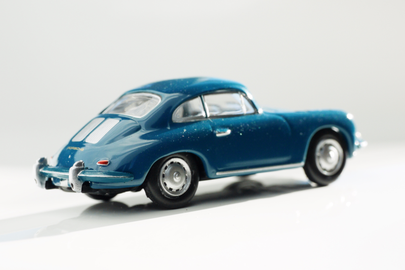 Illustration for article titled Kyosho Porsche 1 1/64 #84 - Projekt RennSport Käfer #2 - 1965 Porsche 356 C Coupe